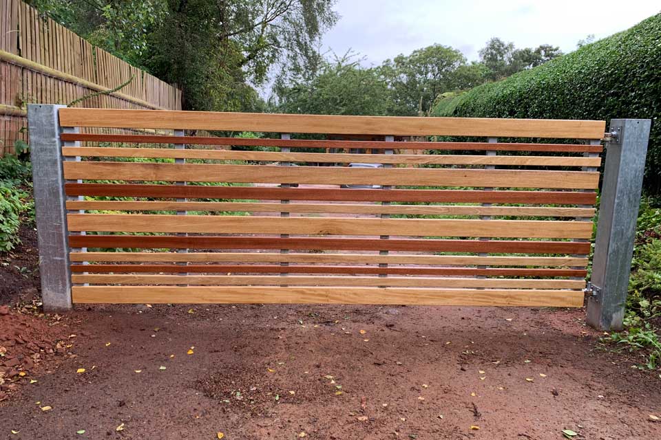 Entrance Gate with Galvernised Posts and Wood Slats